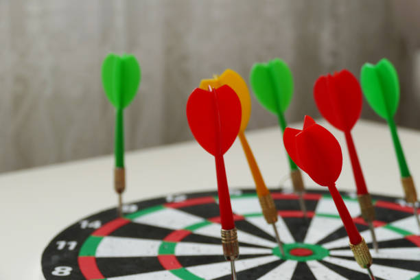 istock dart sport and dart arrows on dart board, 1194443075