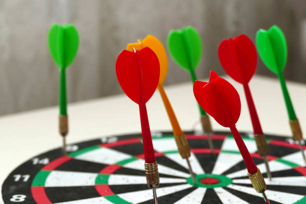 istock dart sport and dart arrows on dart board, 1194443081