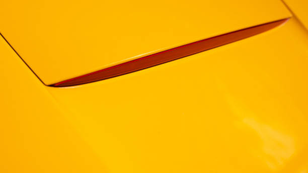 istock Back of yellow orange car 1194443822
