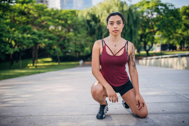 istock Fit lady ready for jogging in park 1194444484