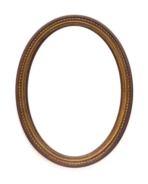 Vintage old retro wooden oval frame isolated on white background.