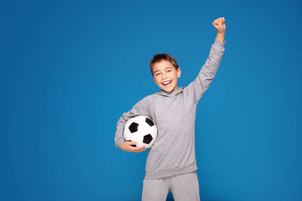 istock Young child sportsman smiling. 1194448279