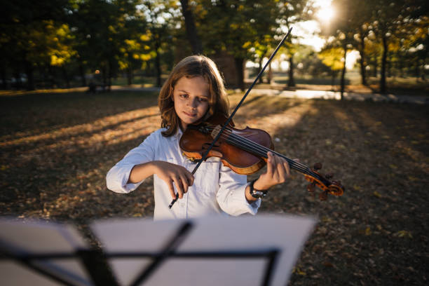 istock Little boy practicing his musical skills 1194454137