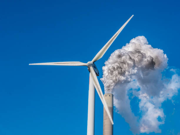 istock Blast furnaces with windmills 1194454213