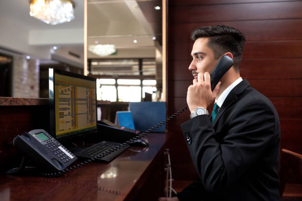 istock Receptionist sitting behind the desk 1194458298