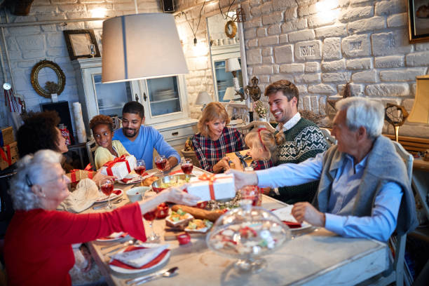istock Christmas eve, exchanging of presents 1194458408