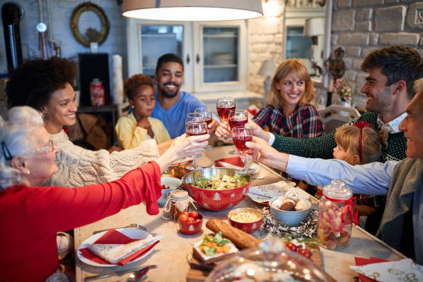 istock Celebrating Christmas with red wine 1194458448