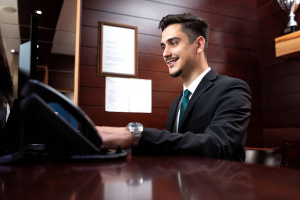 istock Receptionist distributing correspondence and redirecting phone calls 1194459277