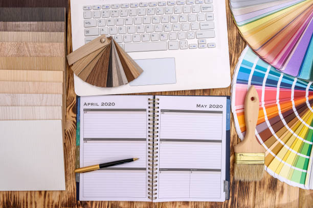 istock Wooden sampler at laptop keyboard on designer's table 1194459301
