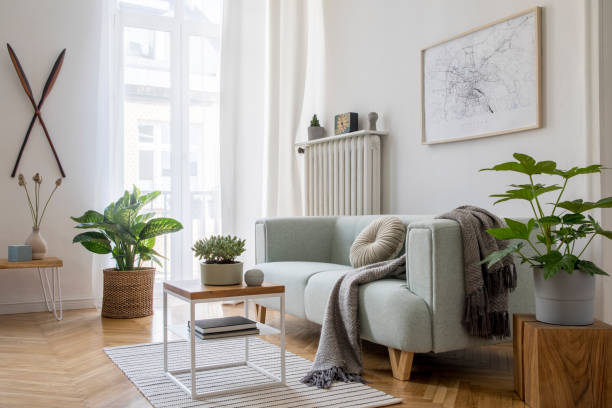 stylish scandinavian living room with design mint sofa, furnitures, mock up poster map, plants and elegant personal accessories. modern home decor. bright and sunny room. template ready to use. - hotel room hotel bedroom picture frame imagens e fotografias de stock