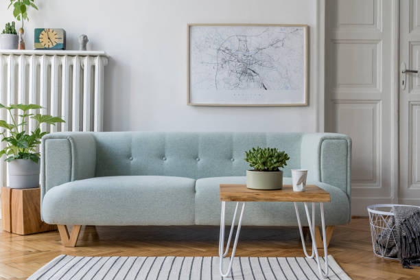 stylish scandinavian living room interior with design mint sofa, furnitures, mock up poster map, plants, and elegant personal accessories. home decor. interior design. template. ready to use. - hotel room hotel bedroom picture frame imagens e fotografias de stock