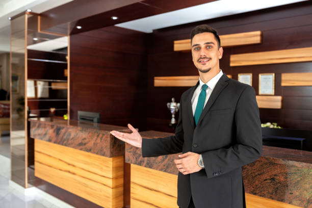 istock Receptionist dressed in fancy suit 1194460547