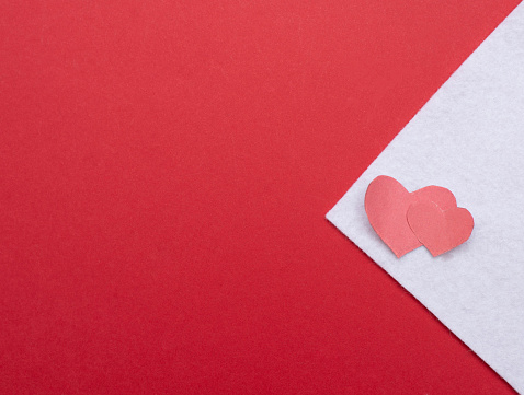 red and white envelope with hearts with copy space