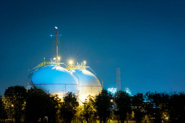gas storage tank Natural gas storage tank  at night lng liquid natural gas stock pictures, royalty-free photos & images