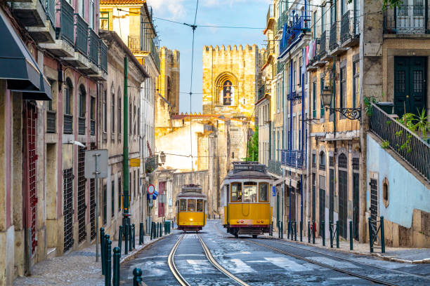 Tram on line 28 in lisbon, portugal Historic tram on line 28, Lisbon, Portugal tram stock pictures, royalty-free photos & images