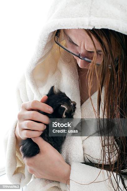 Young Woman Is Speaking Her Kitten Stock Photo - Download Image Now - Adult, Adults Only, Animal