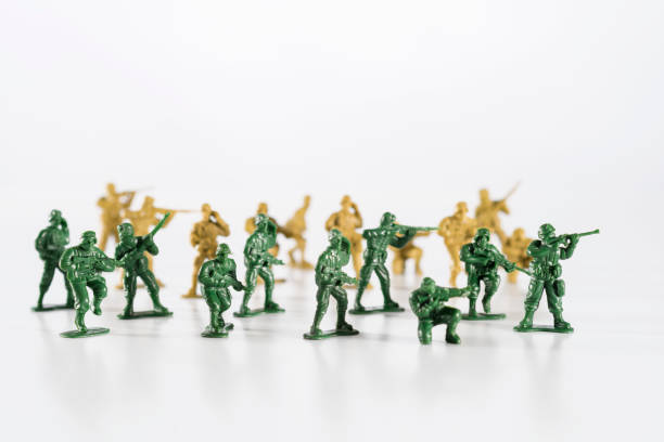 istock Plastic toy soldiers are standing on a white background 1194469888