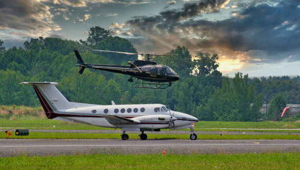 istock Police Helicopter Over Jet 1194471956