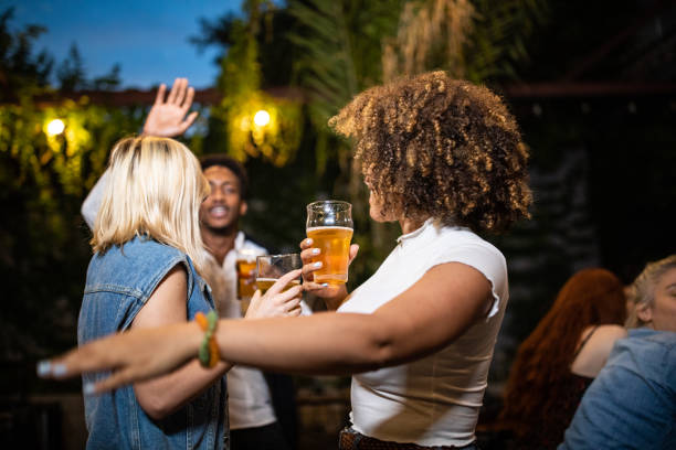 istock Enjoying a fun-filled night with friends in bar 1194472039
