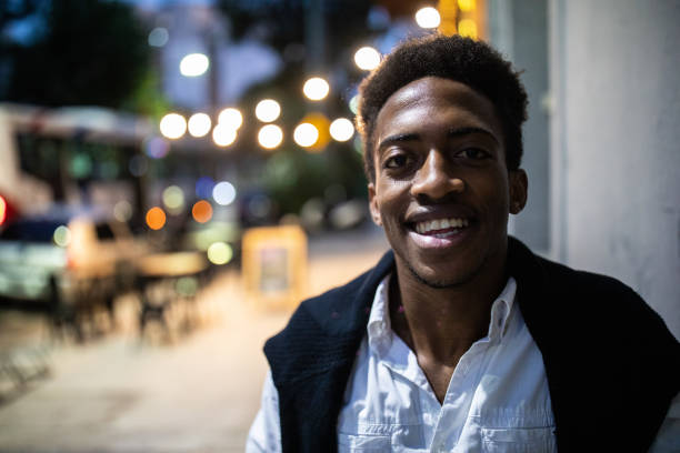 istock Confident Afro man on the street at night 1194472176