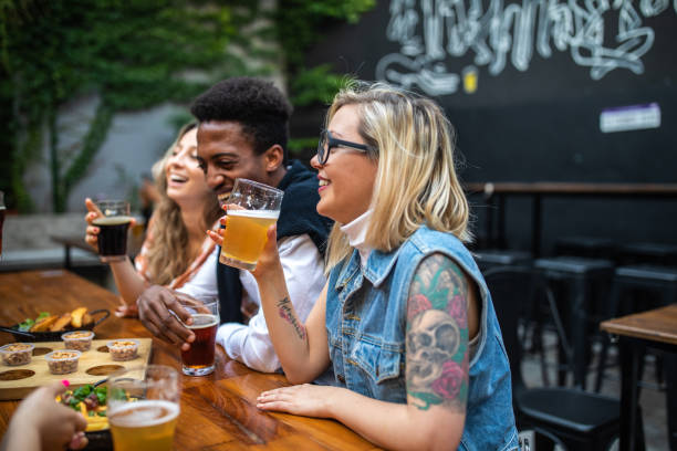 istock Enjoying a pint with her mates 1194472262
