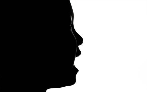 istock Baby Girl Head Silhouette 1194472320