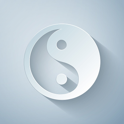 Paper cut Yin Yang symbol of harmony and balance icon isolated on grey background. Paper art style. Vector Illustration