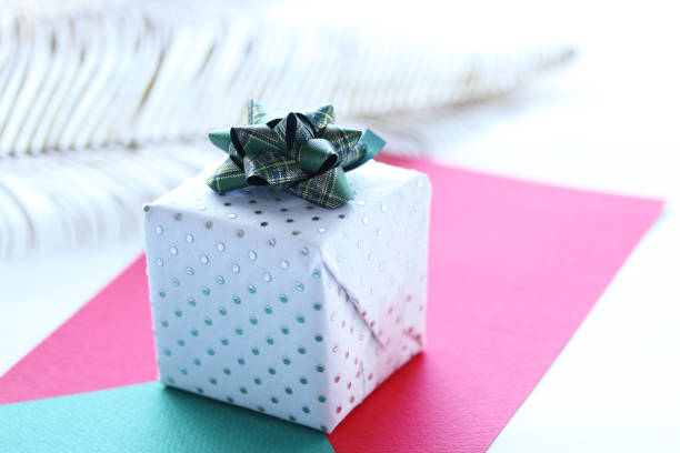 istock white presents and plaid ribbon 1194474171