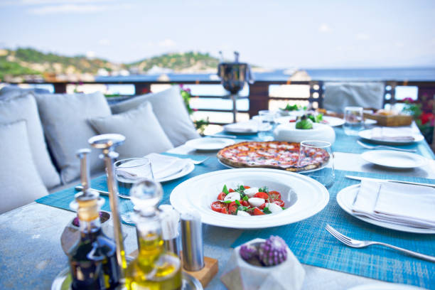 istock Dinner tables near the sea 1194474571