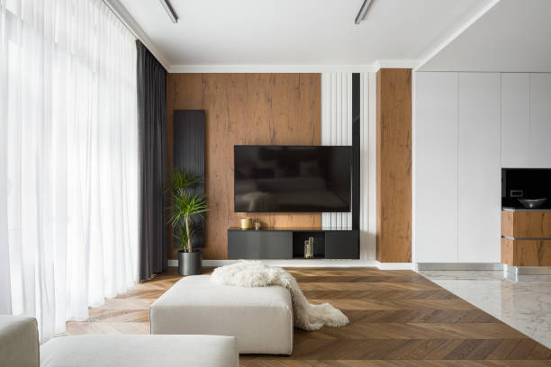 istock Living room with tv open to kitchen 1194478938