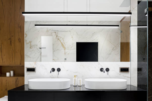 istock Elegant bathroom with two washbasins 1194478963