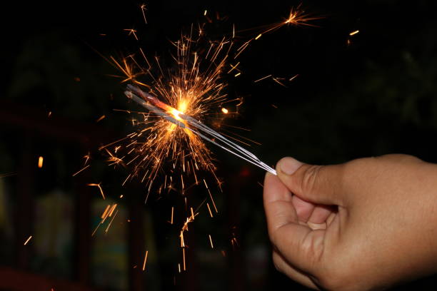 istock Light a small firework to celebrate the new year at night 1194480223