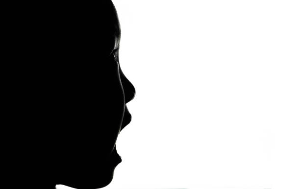 istock Baby Girl Head Silhouette 1194481857