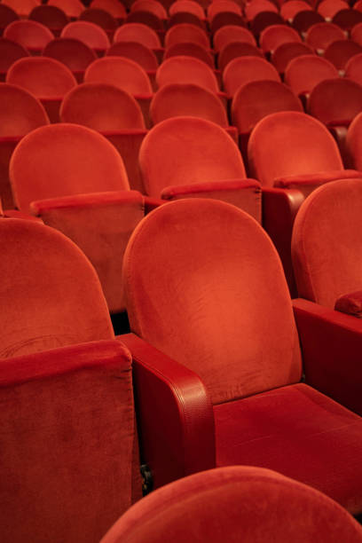 istock Empty comfortable red seats in the theatre/cinema 1194483487