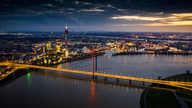 Dusseldorf Citycape, Germany - Aerial Aerial view of Düsseldorf cityscape in Germany. Rhine river in the foreground and television tower and Media Harbour in the background. rhineland stock pictures, royalty-free photos & images