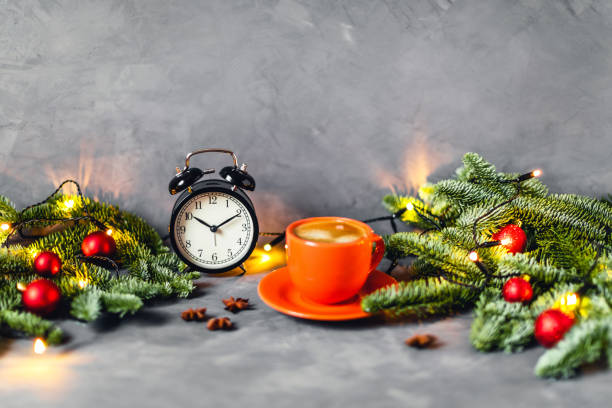 istock Delicious coffee on gray background with spruce branches. 1194486583