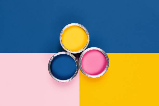 istock Tricolor background with color paint jars. 1194486596