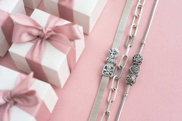 istock Gift box with charm bracelet. 1194487629