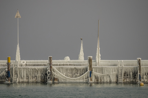 Natural spectacle at the pier at Konstanz harbor after a freezing rain in February.