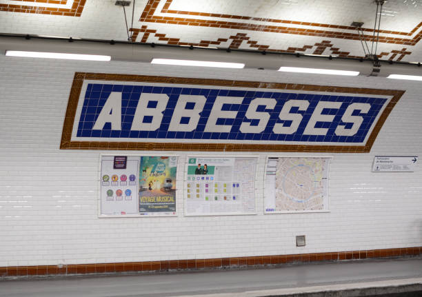 PARIS, FRANCE - SEPTEMBER 16, 2019: Tiled wall of Abbesses metro underground railway station in Montmartre, Paris on September 16, 2019