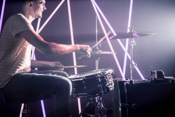 istock the man plays the drums. 1194489060