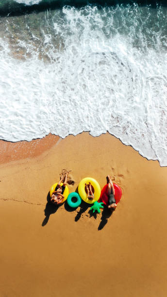 istock Happy family on the beach 1194490251
