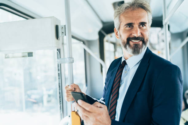 istock Businessman in the public transport 1194491042