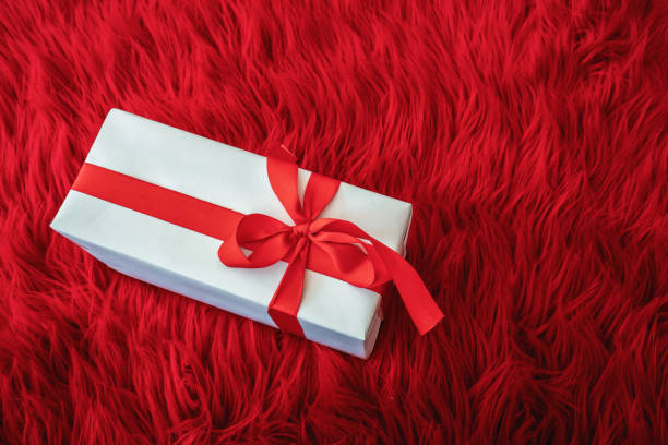 istock Gift box wrapped in diffrent color paper with ribbon bow 1194491099