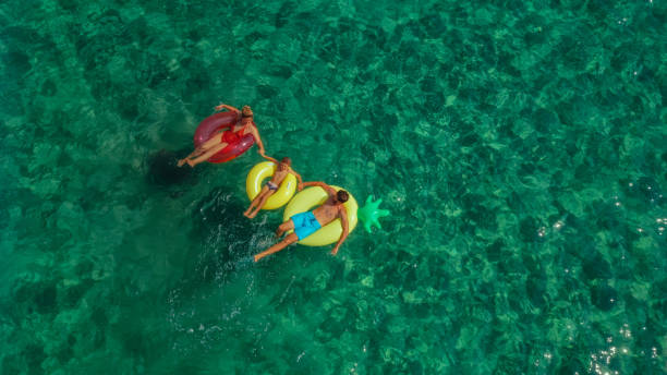 istock Happy family in the sea 1194491321