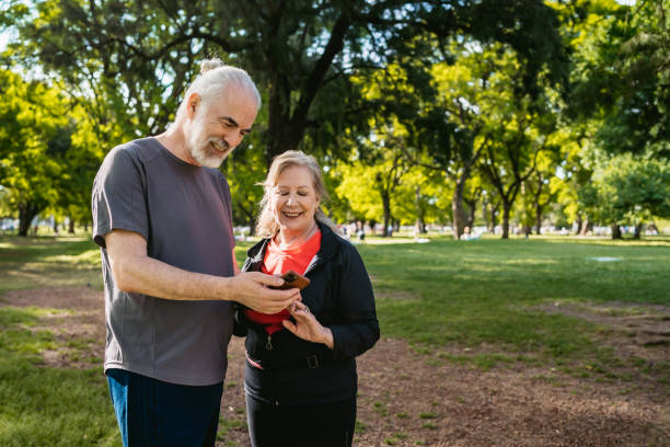 istock Senior couple checking tracking fitness statistics 1194491453
