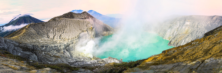 (High Resolution Image) View from above, stunning panoramic view of the Ijen volcano with the beautiful turquoise-coloured acidic crater lake. The Ijen volcano is located in Banyuwangi Regency, East Java, Indonesia.