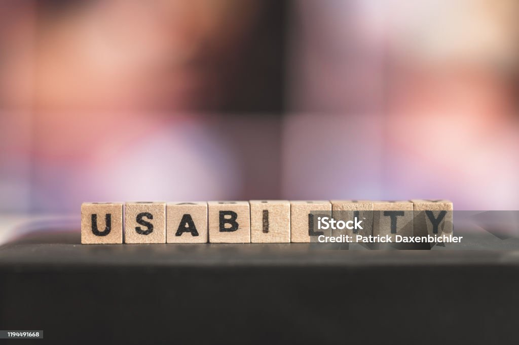 Usability concept: Close up picture of wood cubes with the word “usability” Wood cubes with the word "usability", close up picture with copy space Graphical User Interface Stock Photo