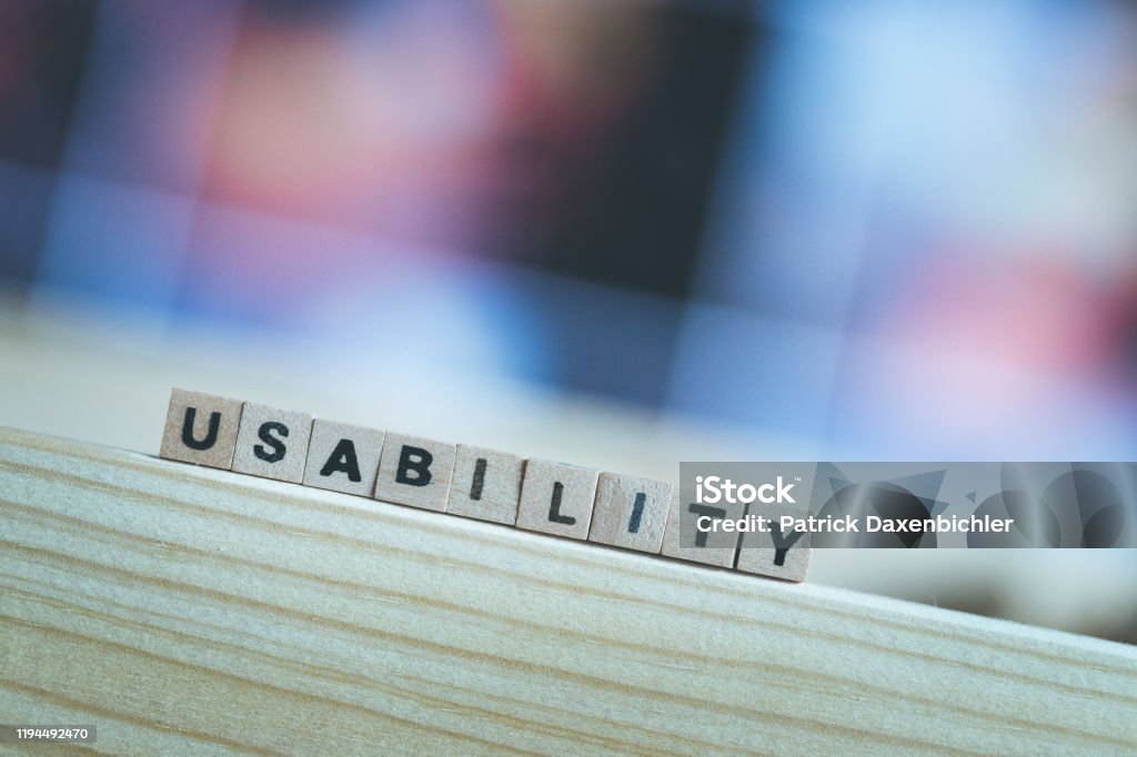 Usability concept: Close up picture of wood cubes with the word “usability” Wood cubes with the word "usability", close up picture with copy space Accessibility Stock Photo