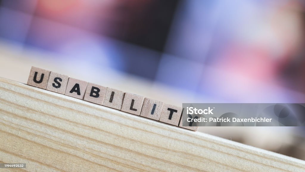 Usability concept: Close up picture of wood cubes with the word “usability” Wood cubes with the word "usability", close up picture with copy space Accessibility Stock Photo